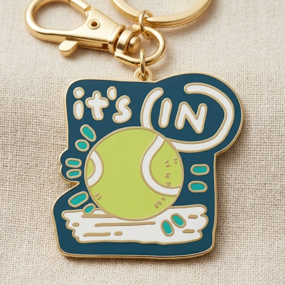 "It's in" - Enamel Keychain