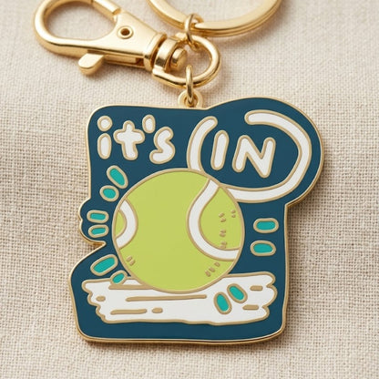 "It's in" - Enamel Keychain